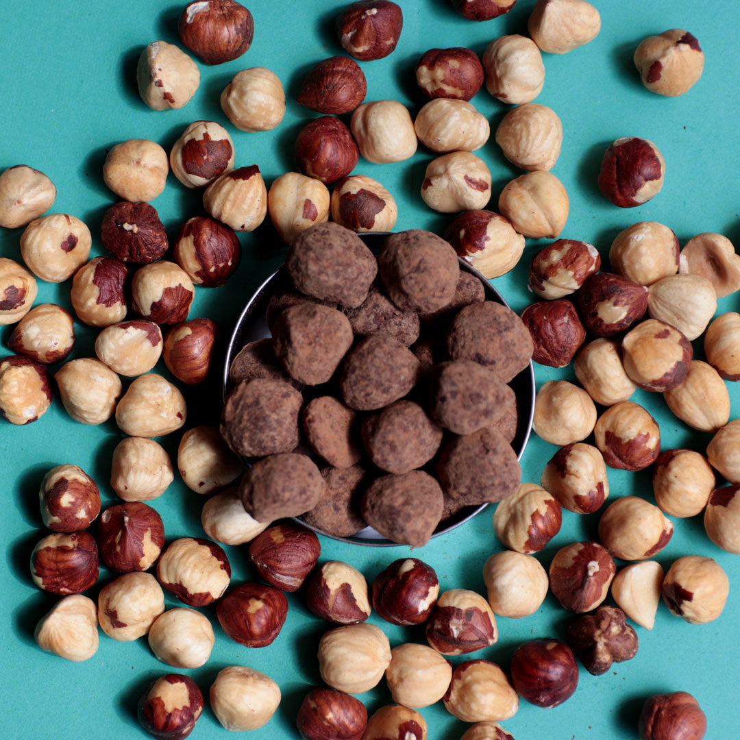 Avellanas bañadas en chocolate 75% cacao.